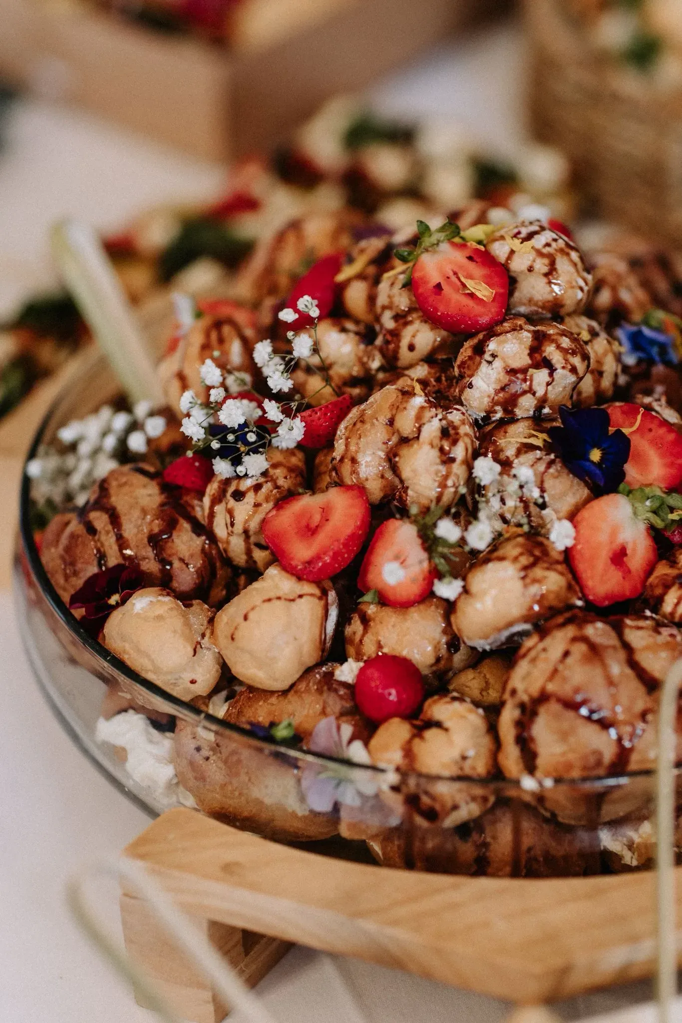 Close up overhead view of a diverse catering spread with salads and platters