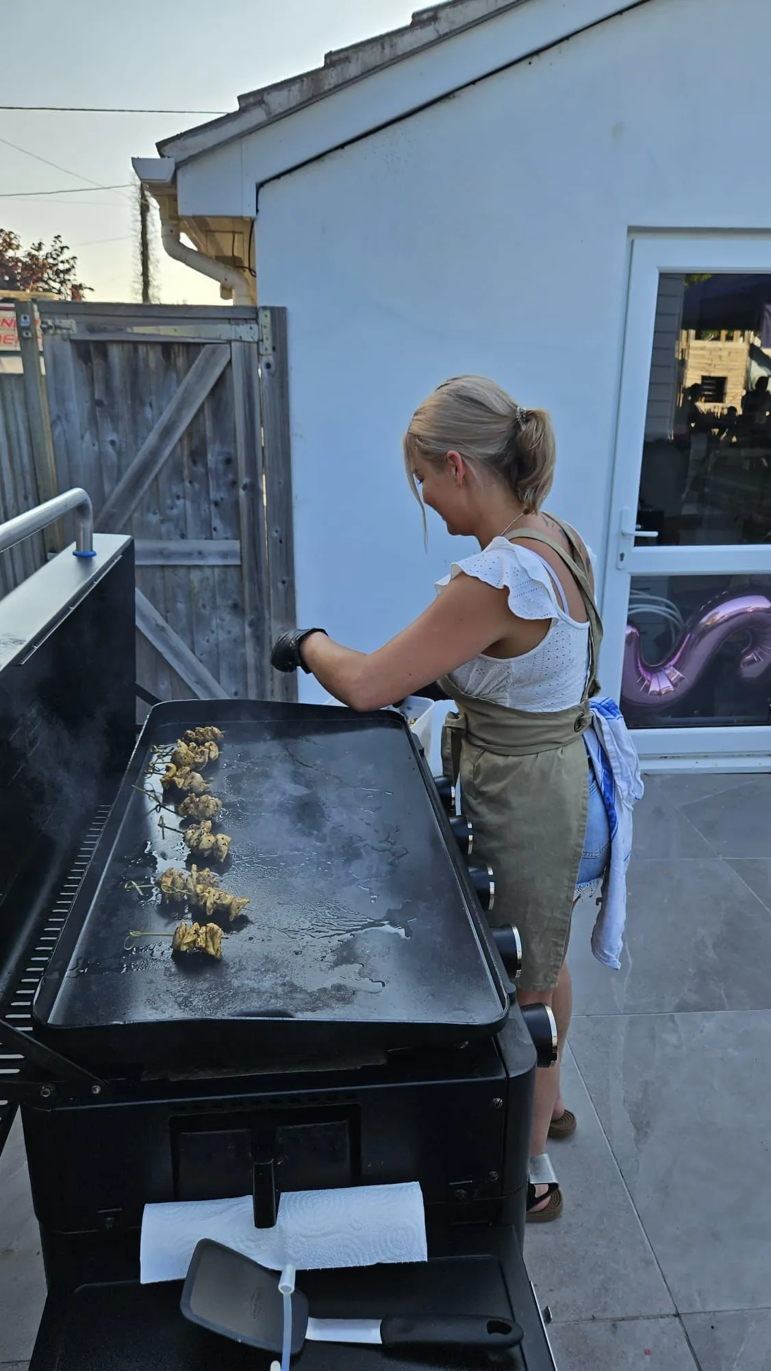 Chef preparing fresh food at an outdoor catering event