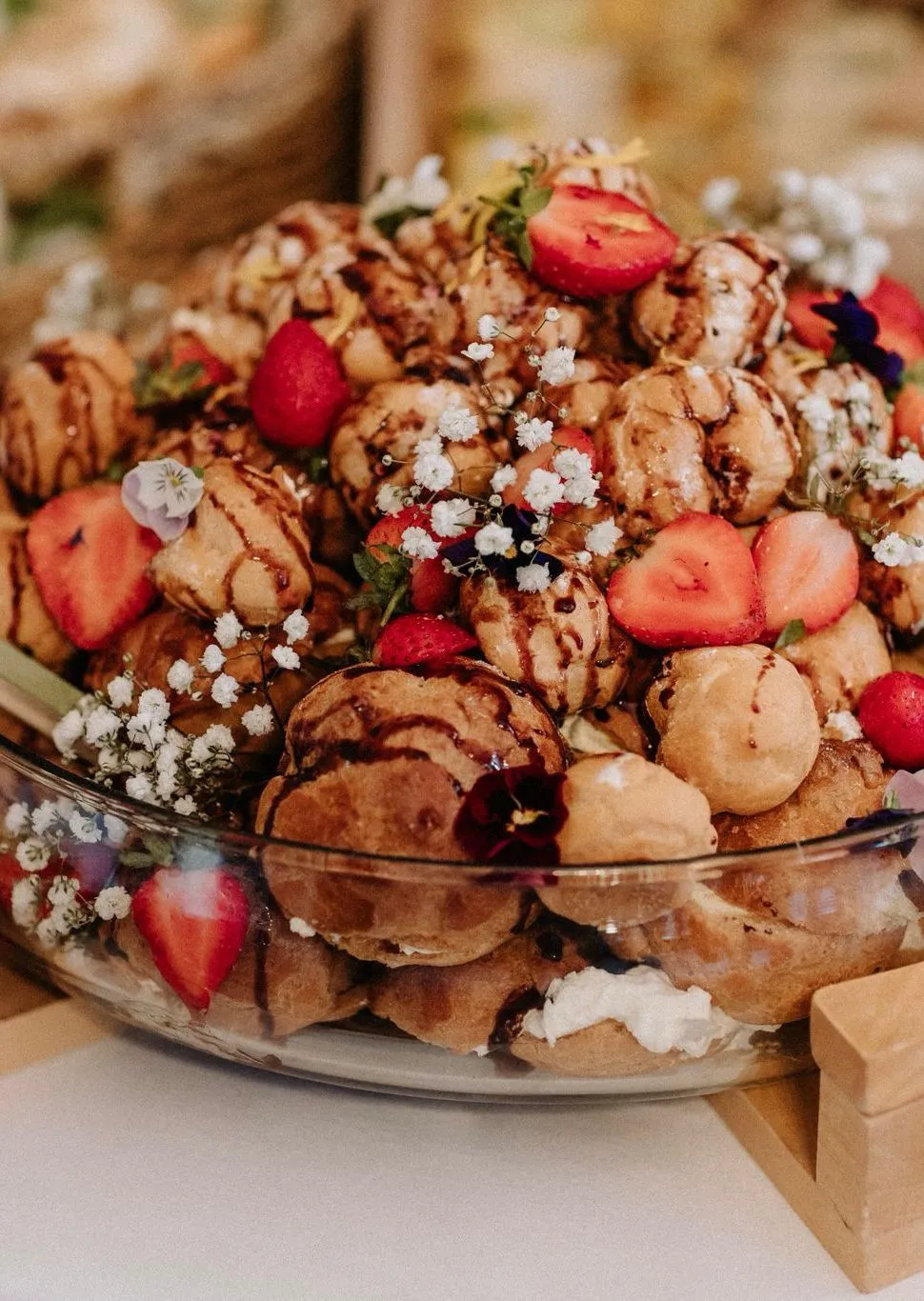 Grazing board focused on desserts, strawberries, and chocolates
